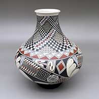 Polychrome jar with a flared opening and a cuadrillos, fine line, and geometric design
 by Jorge Quintana of Mata Ortiz and Casas Grandes