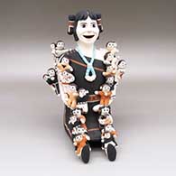 Polychrome storyteller with twenty-four children
 by Esther Suina of Cochiti