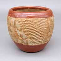 Red and micaceous gold Potsuwii jar with a sgraffito geometric design band around sides
 by Tomasita Reyes Montoya of Ohkay Owingeh