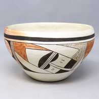 Polychrome bowl polished on the inside with a 4-panel bird element and geometric design on the outside
 by Joy Navasie aka 2nd Frogwoman of Hopi