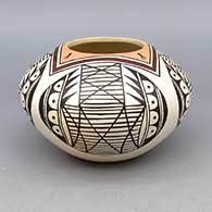 Polychrome bowl with geometric batwing design
 by Tyra Naha of Hopi