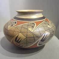Polychrome jar with a rolled lip and a migration pattern design
 by Fannie Nampeyo of Hopi