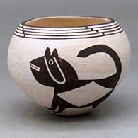 Click for a larger view A black on white jar decorated with a two-panel Mimbres-style animal and geometric design
by Carmel Lewis of Acoma