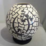 Brown and white jar with sgraffito lizard and web design
 by Leonel Lopez Sr of Mata Ortiz and Casas Grandes