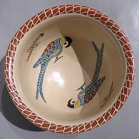 Polychrome bowl with sgraffito and painted parrot and geometric design inside and out
 by Vidal Corona of Mata Ortiz and Casas Grandes