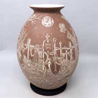 Brown and white jar with sgraffito Night of the Dead design
 by Hector Javier Martinez of Mata Ortiz and Casas Grandes