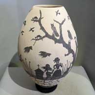 A black and white jar with a sgraffito Day of the Dead design
 by Alfredo Rodriguez of Mata Ortiz and Casas Grandes