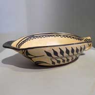 Polychrome gravy tureen with handle and geometric design inside and out 
 by Unknown of Cochiti