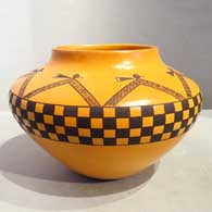Black on yellow ware jar with bird element, checkerboard and geometric design plus fire clouds 
 by Garrett Maho of Hopi