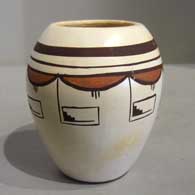 Polychrome white ware jar with geometric design 
 by Fawn Navasie of Hopi