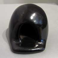 Plain polished black horno pot
 by Unknown of Santa Clara
