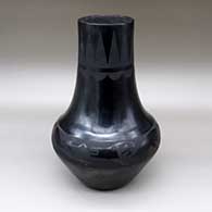 Tall black on black jar with avanyu and geometric design
 by Maria Martinez of San Ildefonso
