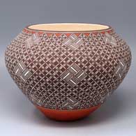 Polychrome jar with a spiral snowflake geometric design
 by Rebecca Lucario of Acoma