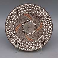 Polychrome plate with geometric design
 by Rebecca Lucario of Acoma