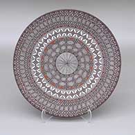 Polychrome plate with fine line and geometric design
 by Rebecca Lucario of Acoma