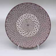 Black and white plate with a fine line and geometric design
 by Amanda Lucario of Acoma