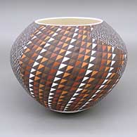 Polychrome bowl with a geometric design based around a checkerboard background
 by Frederica Antonio of Acoma