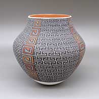 Polychrome jar with a geometric design based on a checkerboard background
 by Frederica Antonio of Acoma