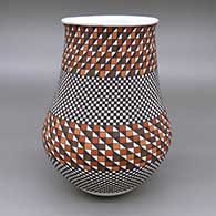 Polychrome jar with a slightly flared opening and a geometric design based on a checkerboard background
 by Frederica Antonio of Acoma
