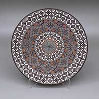 Polychrome plate with a fine line and geometric design
 by Rebecca Lucario of Acoma