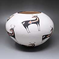 A polychrome jar decorated with three bands of deer-with-heart-line design
 by Emma Lewis of Acoma