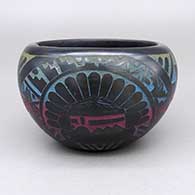 Black and rainbow bowl with a sgraffito dancer, sun face, and geometric design
 by Ergil Vallo of Acoma