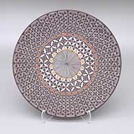 Polychrome plate with a fine line and geometric design
 by Amanda Lucario of Acoma