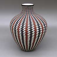 Polychrome jar with a flared opening and a geometric design
 by Paula Estevan of Acoma