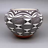 Polychrome jar with a painted fine line and geometric design
 by Rebecca Lucario of Acoma