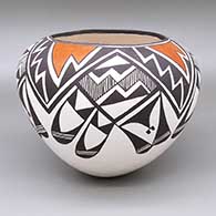 Polychrome jar with a fine line and geometric design
 by Lucy Lewis of Acoma