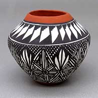 Small polychrome jar with a feather ring, fine line, and geometric design
 by Sandra Victorino of Acoma