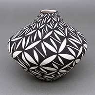 Black-on-white jar with a geometric design
 by Sandra Victorino of Acoma