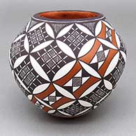 Small polychrome jar with a fine line and geometric design
 by Rebecca Lucario of Acoma