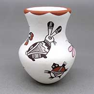 Small polychrome jar with a flared opening and a dragonfly, parrot, hummingbird, turtle, rabbit, butterfly, lizard, insect, and geometric design
 by Judy Lewis of Acoma
