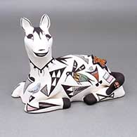 Polychrome horse figure with an applique and painted butterfly, bird, hummingbird, ladybug. Lizard, fine line, and geometric design
 by Judy Lewis of Acoma