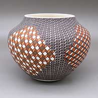 Polychrome jar with a geometric design based on a checkerboard background
 by Frederica Antonio of Acoma