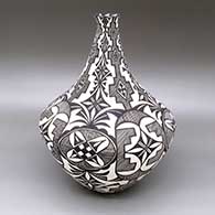 Black-on-white jar with a slightly flared opening, a tall neck, and a fine line, checkerboard, kiva step, and geometric design
 by Sandra Victorino of Acoma