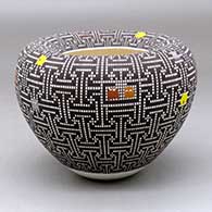 Click for a larger view A polychrome jar with an Infinity rim and decorated with a tiny square geometric design and PacMan figures
 by Frederica Antonio of Acoma