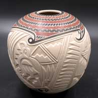 Polychrome jar with lightly carved, sgraffito and painted roadrunner, serpent and geometric design
 by Martin Olivas of Mata Ortiz and Casas Grandes