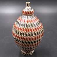 Polychrome lidded jar with a geometric design and matching custom stand
 by Rosalba Lopez of Mata Ortiz and Casas Grandes