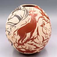 Polychrome jar with a sgraffito optical illusion wildlife and geometric design
 by Abraham Rodriguez of Mata Ortiz and Casas Grandes