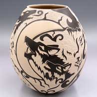 Polychrome jar with a sgraffito and slipped optical illusion wildlife, nature and geometric design
 by Abraham Rodriguez of Mata Ortiz and Casas Grandes
