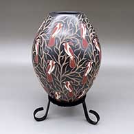 Polychrome jar with a sgraffito and painted bird and branch design
 by Elicena Cota of Mata Ortiz and Casas Grandes