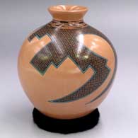 Polychrome jar with a flared rim and a geometric design
 by Gerardo Tena of Mata Ortiz and Casas Grandes