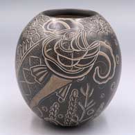 Black-and-white jar with a sgraffito and painted 2-panel fish and underwater scene
 by Jose Almeraz of Mata Ortiz and Casas Grandes