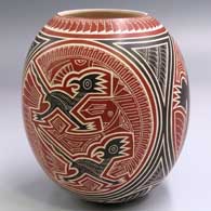 Polychrome jar with a sgraffito and painted turtle, roadrunner, lizard and geometric design
 by Humberto Pina of Mata Ortiz and Casas Grandes