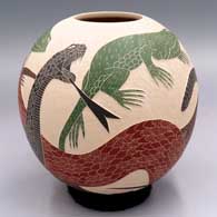 Polychrome jar with a sgraffito and painted serpent and iguana design
 by Humberto Guillen Rodriguez of Mata Ortiz and Casas Grandes