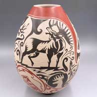 Polychrome jar with a sgraffito and slipped optical illusion wildlife, nature and geometric design
 by Abraham Rodriguez of Mata Ortiz and Casas Grandes