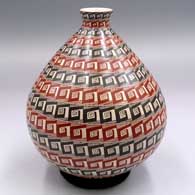 Thin neck jar with a flared rim and painted with bands of geometric design
 by Oralia Lopez of Mata Ortiz and Casas Grandes
