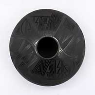 Black-on-black jar with geometric design
 by Octavio Andrew of Mata Ortiz and Casas Grandes